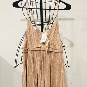 New with tags, summer dress size M. Mid length.